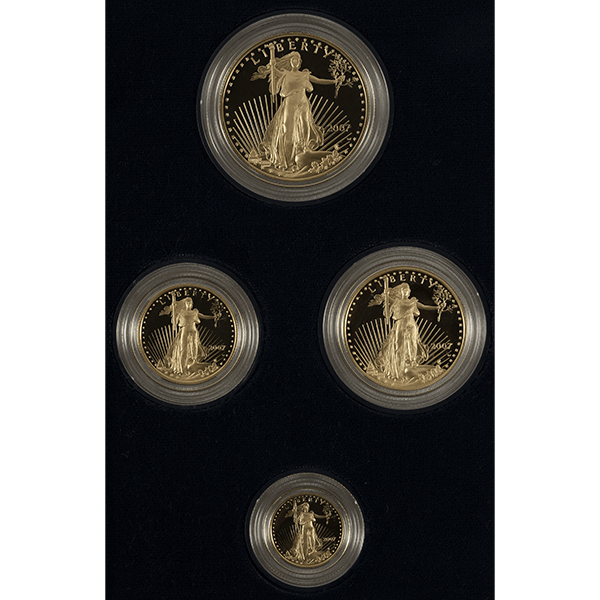 Close-up of 2007 American Gold Eagle Proof Set featuring 4 gold coins in varying sizes with Lady Liberty design.